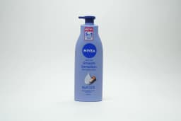 Nivea Triple Action Body Lotion 400 ml - image 1