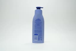 Nivea Triple Action Body Lotion 400 ml - image 2